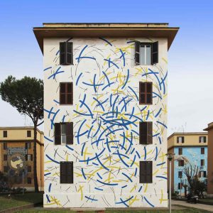 moneyless-opera sulla facciata di una casa a Roma